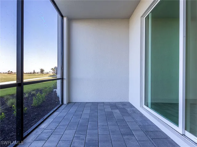 a view of a room with cabinet and a ocean view