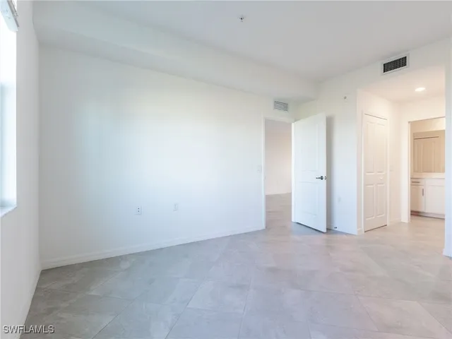 a view of a street with sitting area