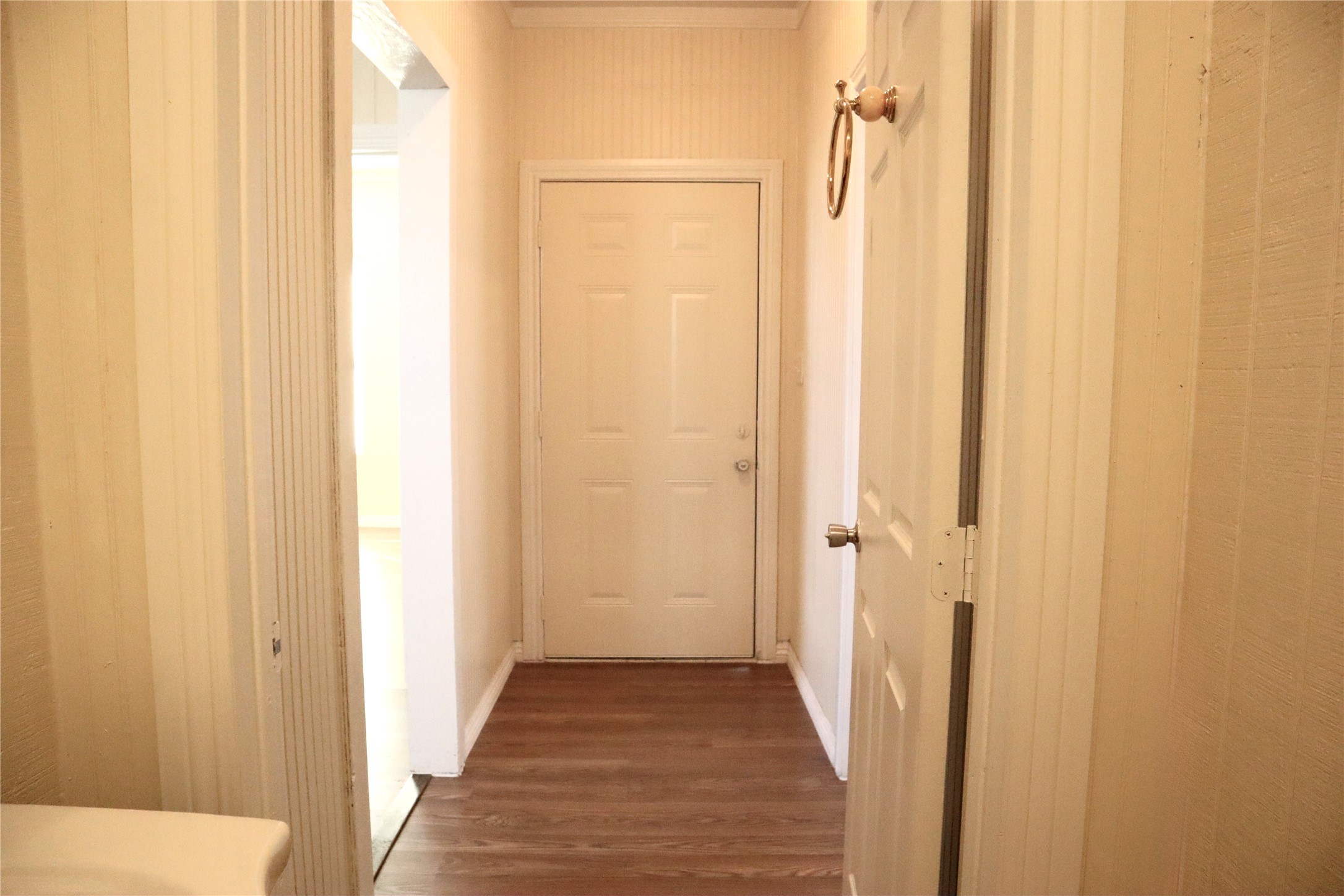2689 County Road 32 Angleton, TX 77515 - Photo 8 of 15 a view of a bathroom from the hallway