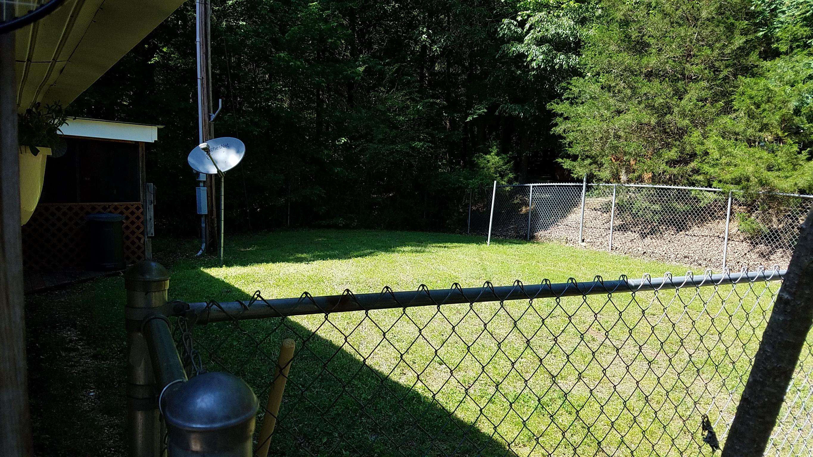 7128 Cuba Landing Road Waverly, TN 37185 - Photo 4 of 13 Back yard
