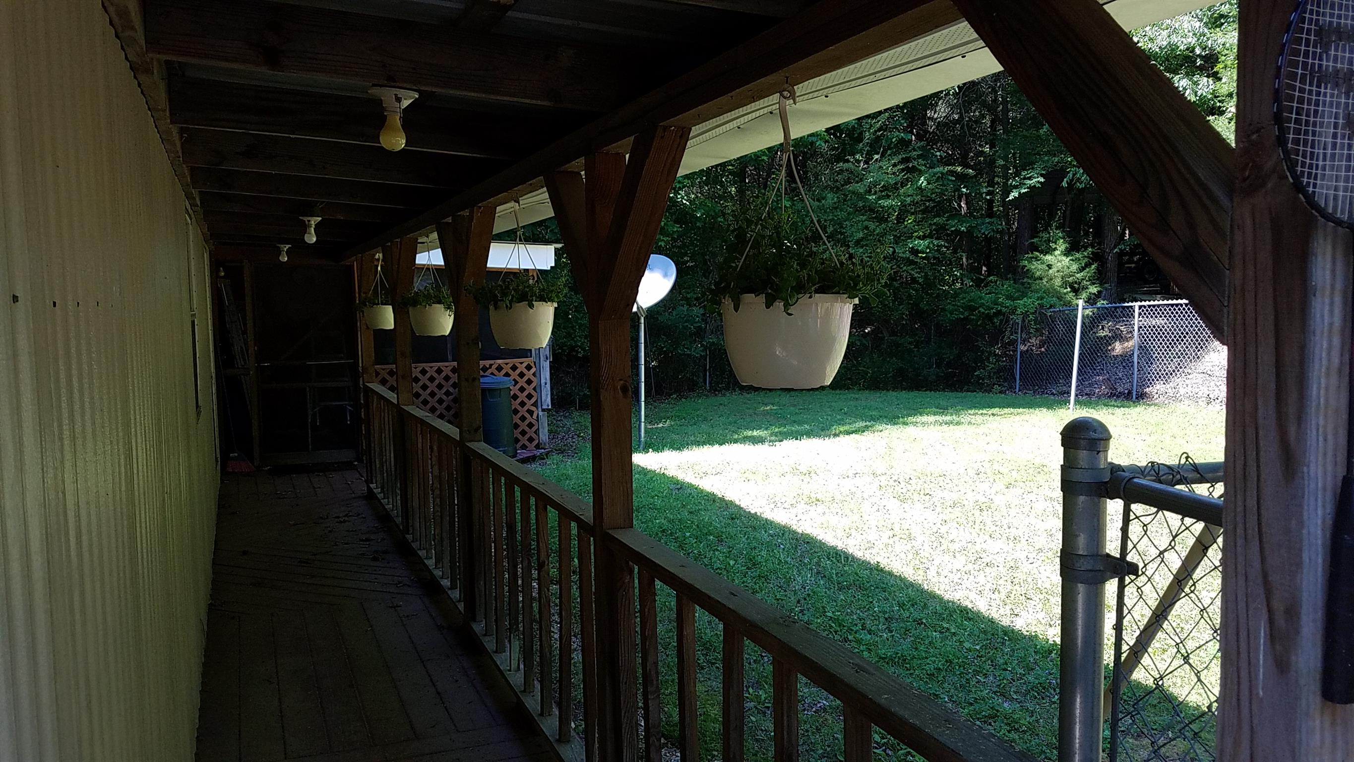 7128 Cuba Landing Road Waverly, TN 37185 - Photo 5 of 13 deck on back of home