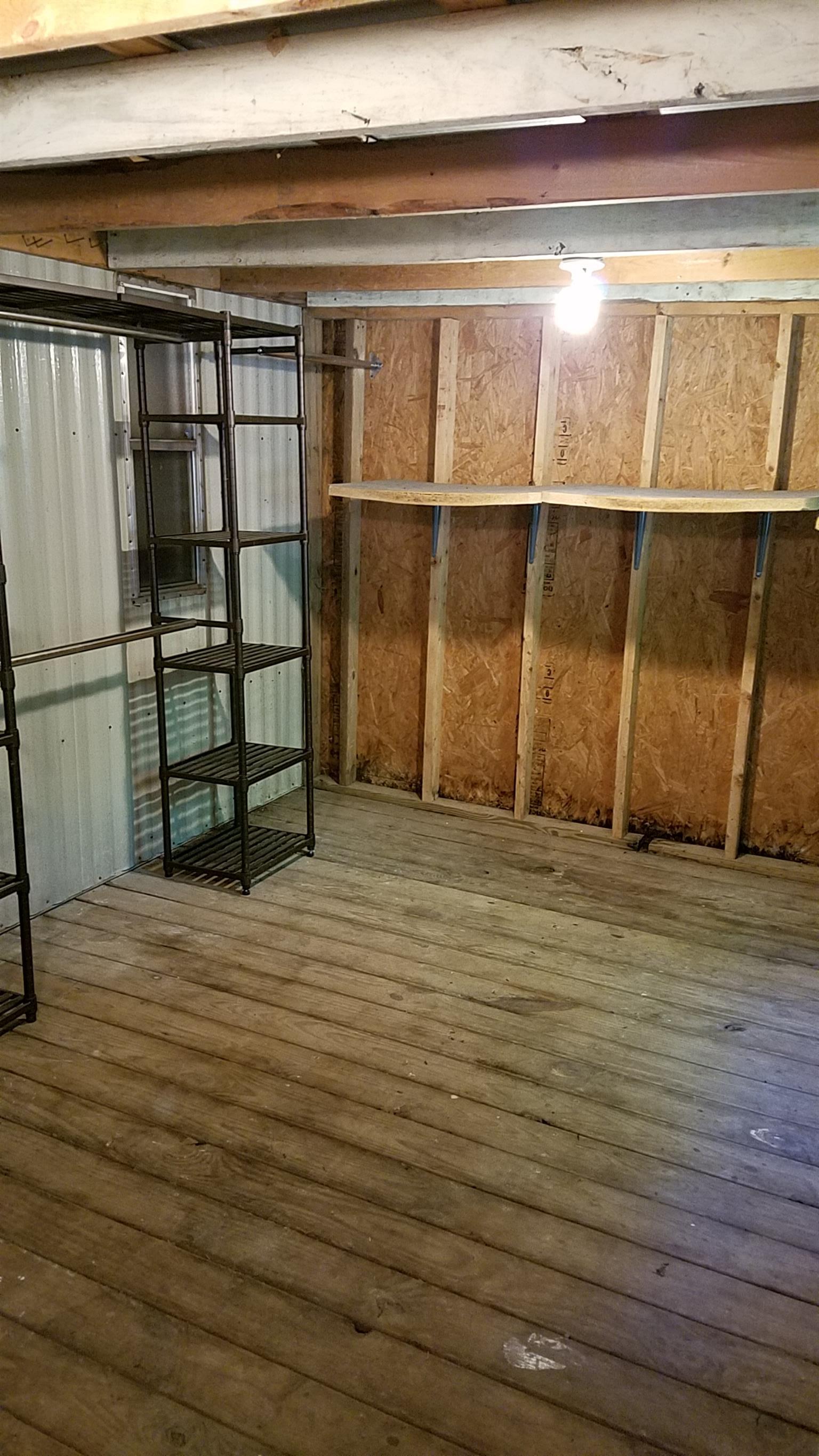 7128 Cuba Landing Road Waverly, TN 37185 - Photo 7 of 13 Storage room