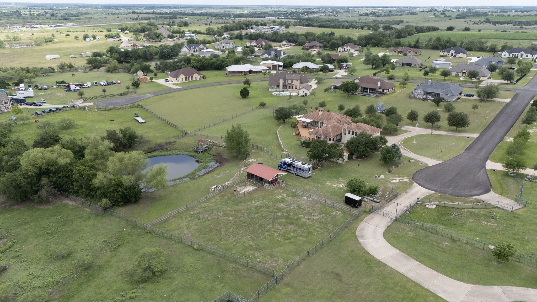 17308 St Therese Road Manor, TX 78653 - Photo 37 of 40 an aerial view of a house with a yard