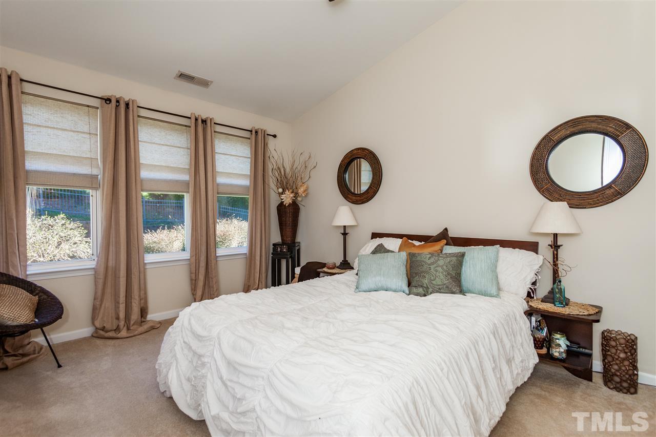 6014 Viking Drive Raleigh, NC 27612 - Photo 12 of 25 The master bedroom is tastefully painted.