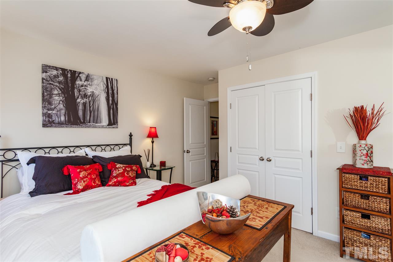 6014 Viking Drive Raleigh, NC 27612 - Photo 16 of 25 This large secondary bedroom acts as a dual master with its own private bathroom.