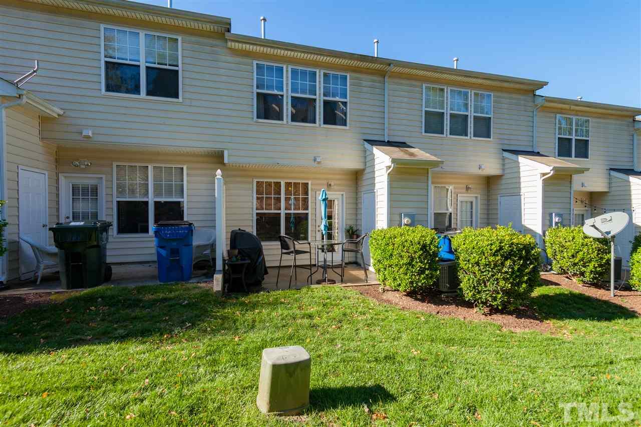 6014 Viking Drive Raleigh, NC 27612 - Photo 19 of 25 Awesome grassy area behind the home!! Just off the patio.