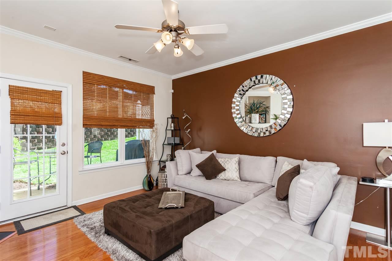 6014 Viking Drive Raleigh, NC 27612 - Photo 3 of 25 The family room is open and bright. it has been wonderfully painted. There are hardwoods throughout the whole downstairs.