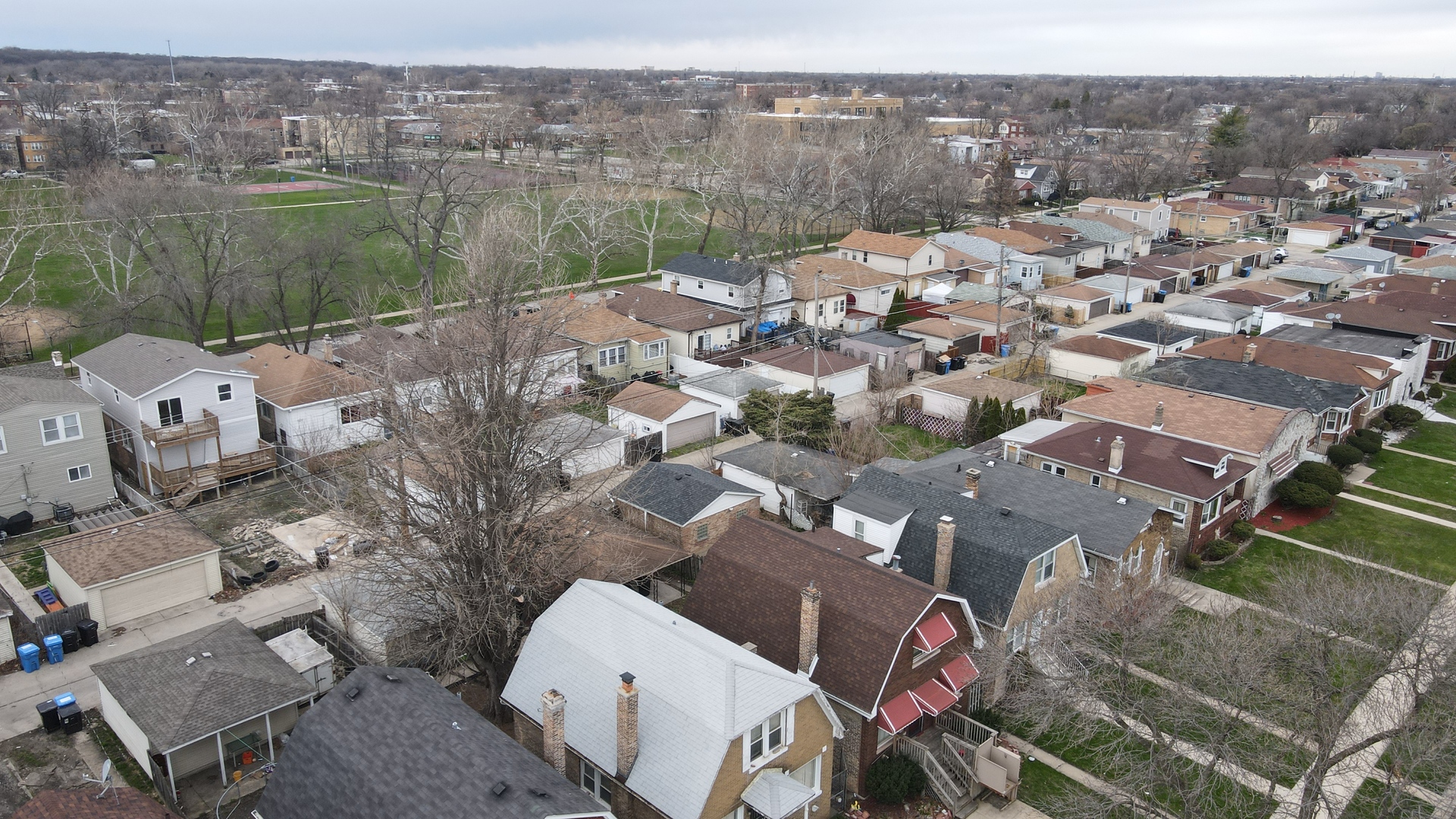 9154 South May Street Chicago, IL 60620 - Photo 6 of 40 an aerial view of a house with a lake view