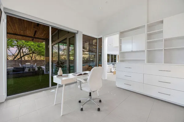 a living room with furniture and a window