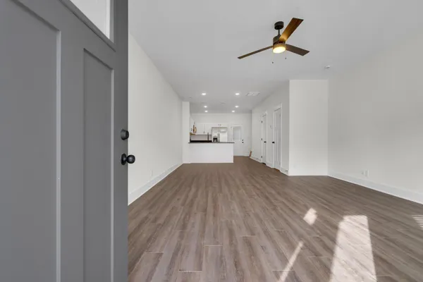 a view of kitchen with wooden floor