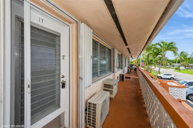 a view of swimming pool outdoor outdoor seating and city view