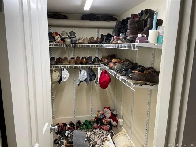 a room with lots of different colored cloths