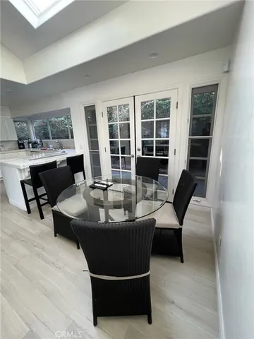 a bedroom with bed and window