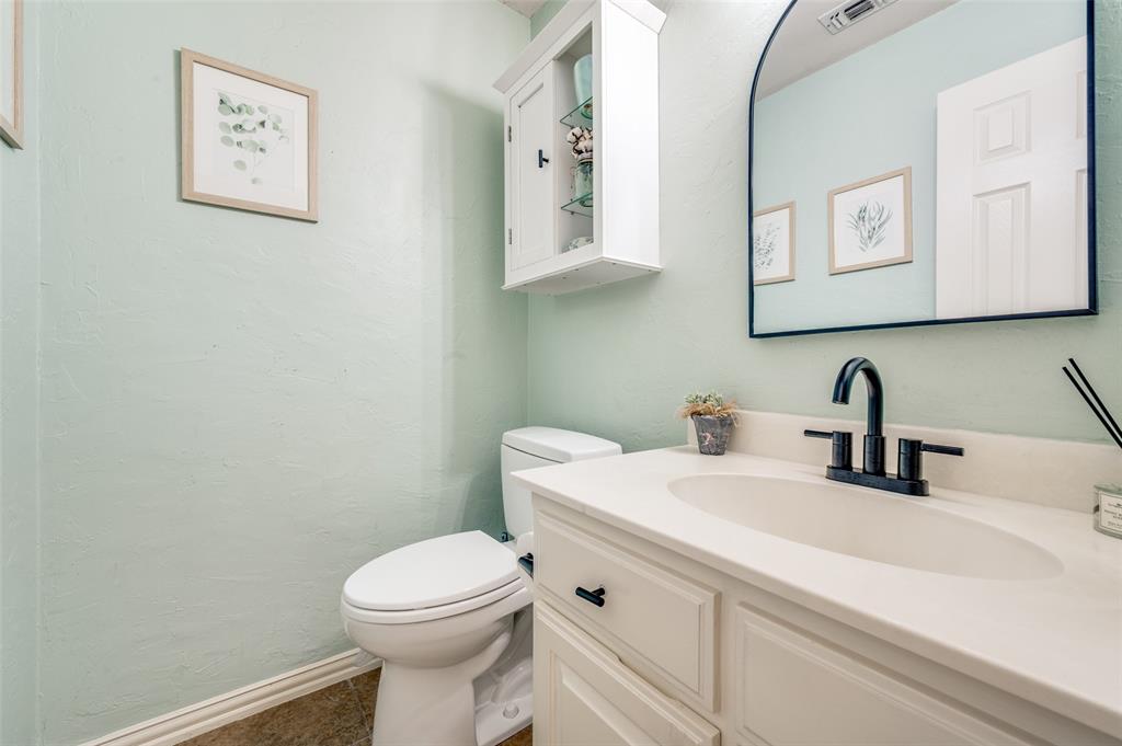 2109 Grayson Road McKinney, TX 75072 - Photo 16 of 31 First floor half bath off kitchen.