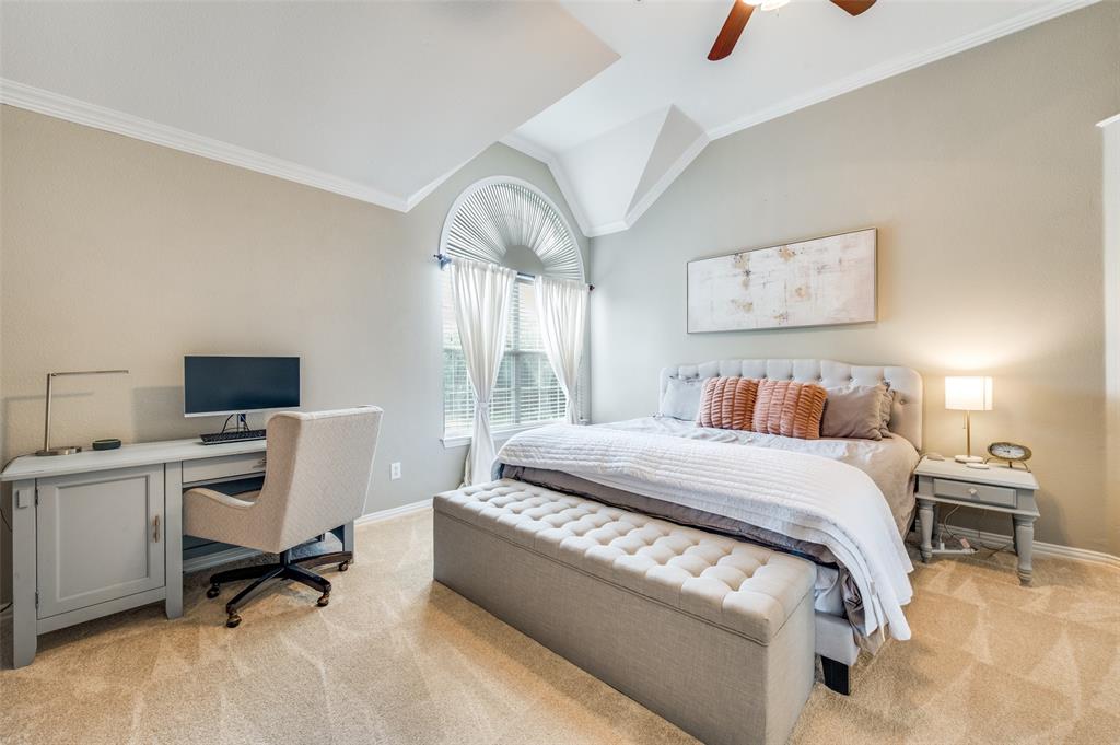 2109 Grayson Road McKinney, TX 75072 - Photo 23 of 31 Spacious primary bedroom has large ensuite bath and walk in closet.