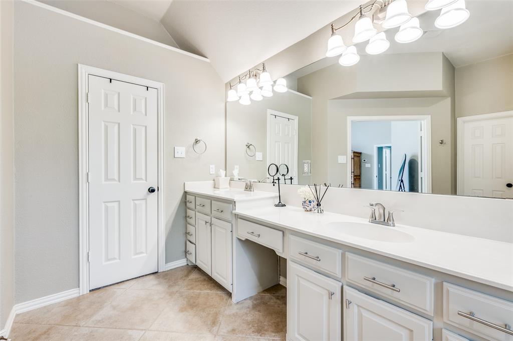 2109 Grayson Road McKinney, TX 75072 - Photo 26 of 31 Primary ensuite bath has pleny of counter space, dual sinks.