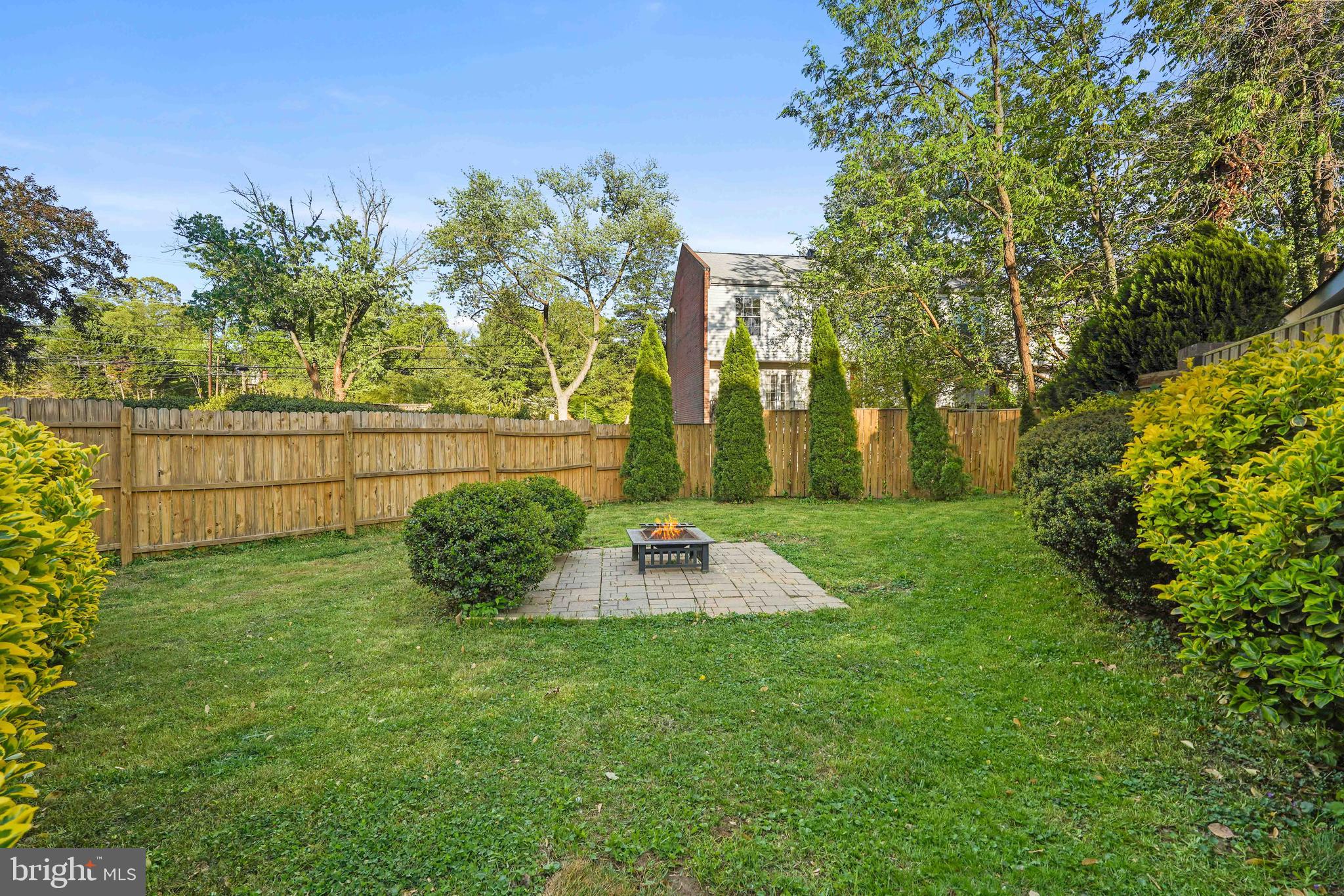 1910 Elkhart Street Silver Spring, MD 20910 - Photo 36 of 47 a backyard of a house with lots of green space