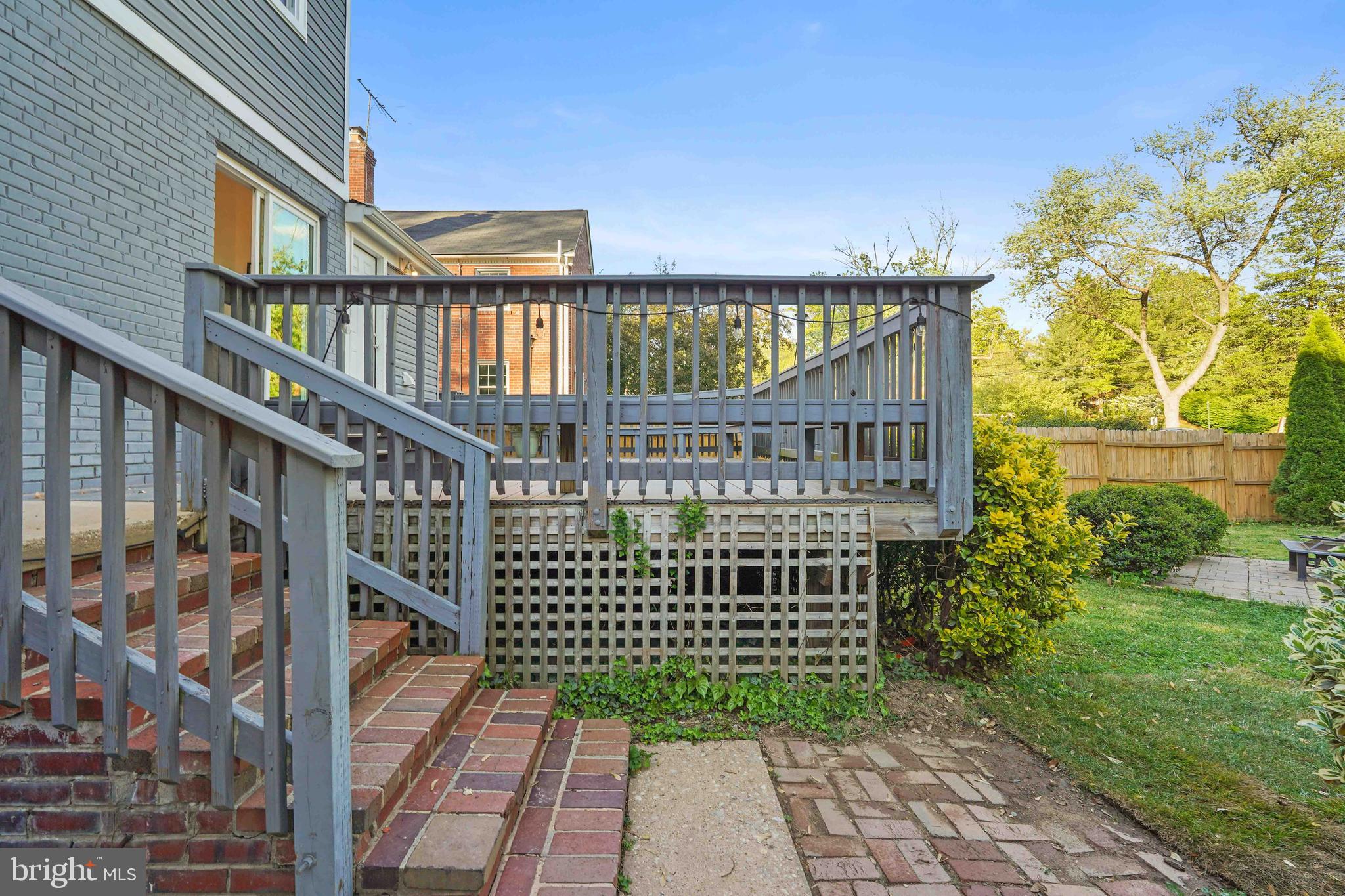 1910 Elkhart Street Silver Spring, MD 20910 - Photo 41 of 47 a view of a brick house with a wooden deck
