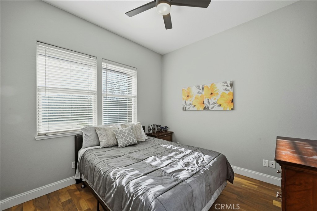 18216 Hidden Valley Road Hidden Valley Lake, CA 95467 - Photo 15 of 26 a bedroom with a bed and a window