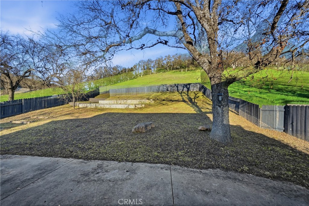 18216 Hidden Valley Road Hidden Valley Lake, CA 95467 - Photo 20 of 26 a view of a yard with plants and trees