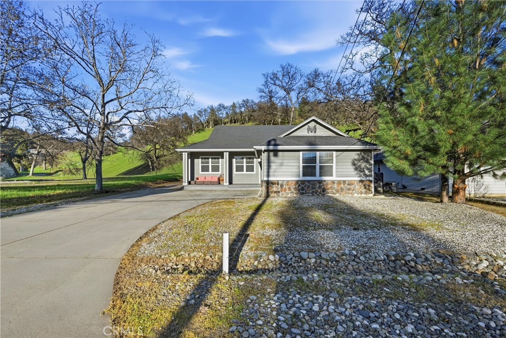 18216 Hidden Valley Road Hidden Valley Lake, CA 95467 - Photo 25 of 26 a front view of a house with a yard