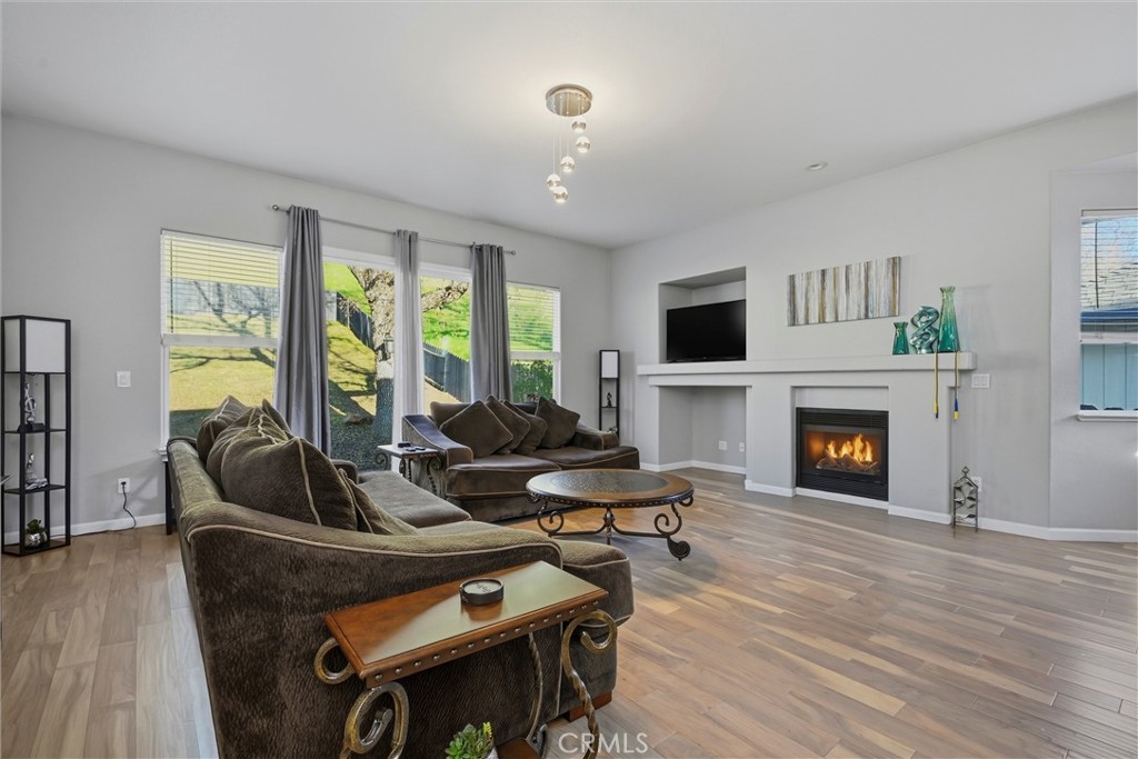 18216 Hidden Valley Road Hidden Valley Lake, CA 95467 - Photo 4 of 26 a living room with furniture and a fireplace