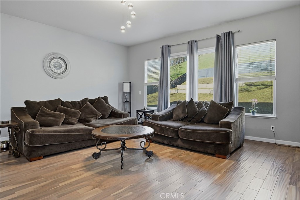 18216 Hidden Valley Road Hidden Valley Lake, CA 95467 - Photo 5 of 26 a living room with furniture and a large window