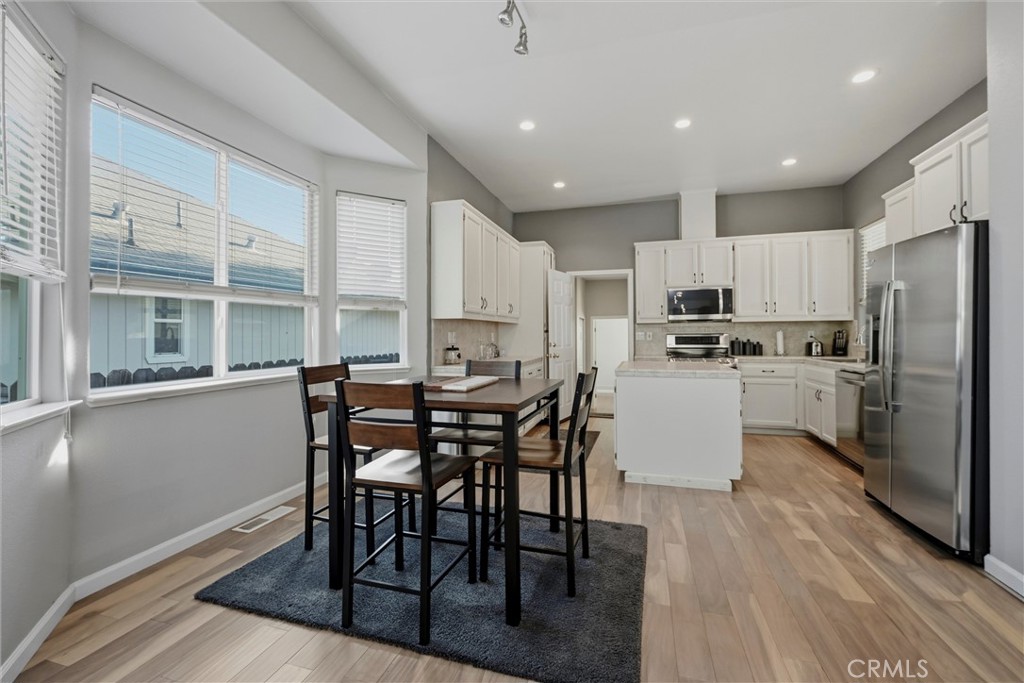 18216 Hidden Valley Road Hidden Valley Lake, CA 95467 - Photo 6 of 26 a kitchen with kitchen island wooden cabinets and stainless steel appliances