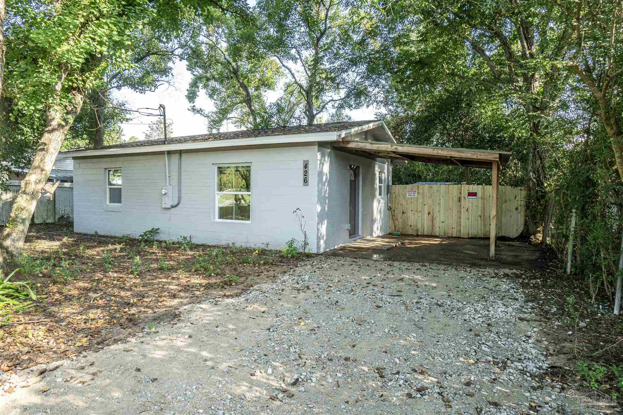 426 Forrest Street Cantonment, FL 32533 - Photo 24 of 25 a backyard of a house