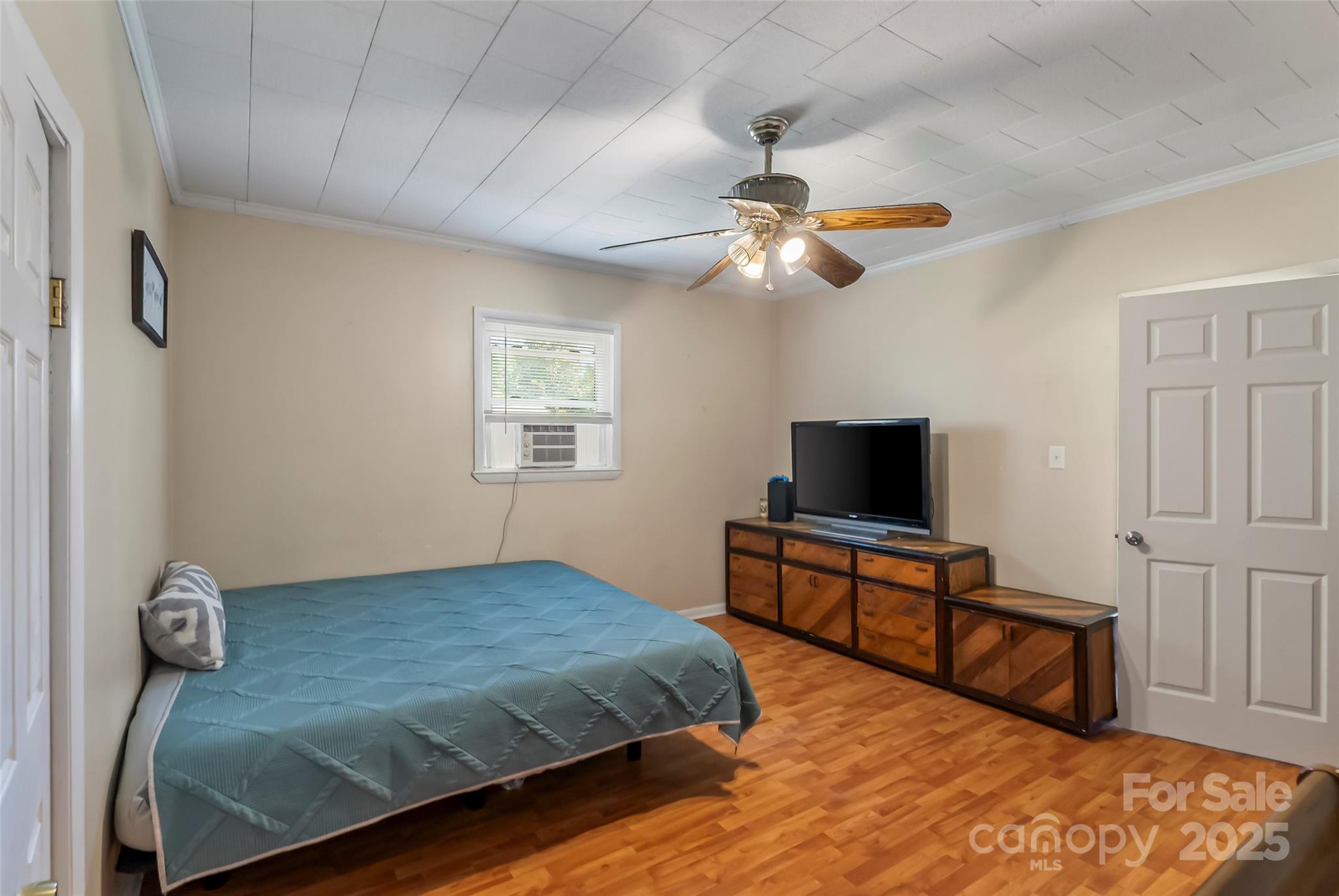 205 Abington Road Northwest Lenoir, NC 28645 - Photo 12 of 19 a bedroom with a bed and a flat screen tv