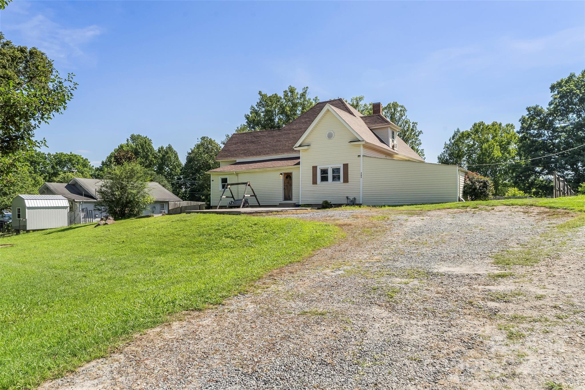 205 Abington Road Northwest Lenoir, NC 28645 - Photo 18 of 19 a front view of a house with a yard and garage