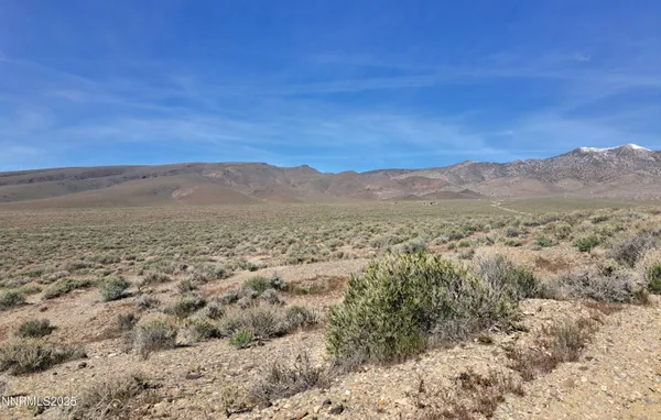 a view of mountain view with mountains in the background