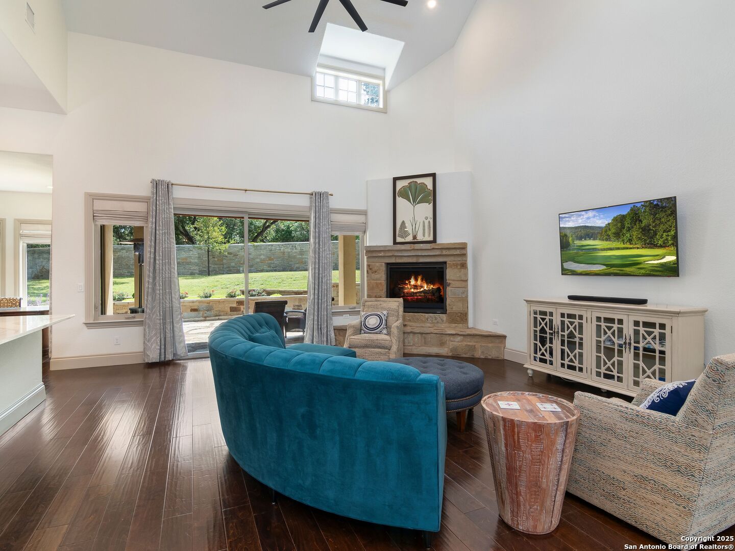 110 Manorbrook San Antonio, TX 78230 - Photo 11 of 40 a living room with furniture and a fireplace