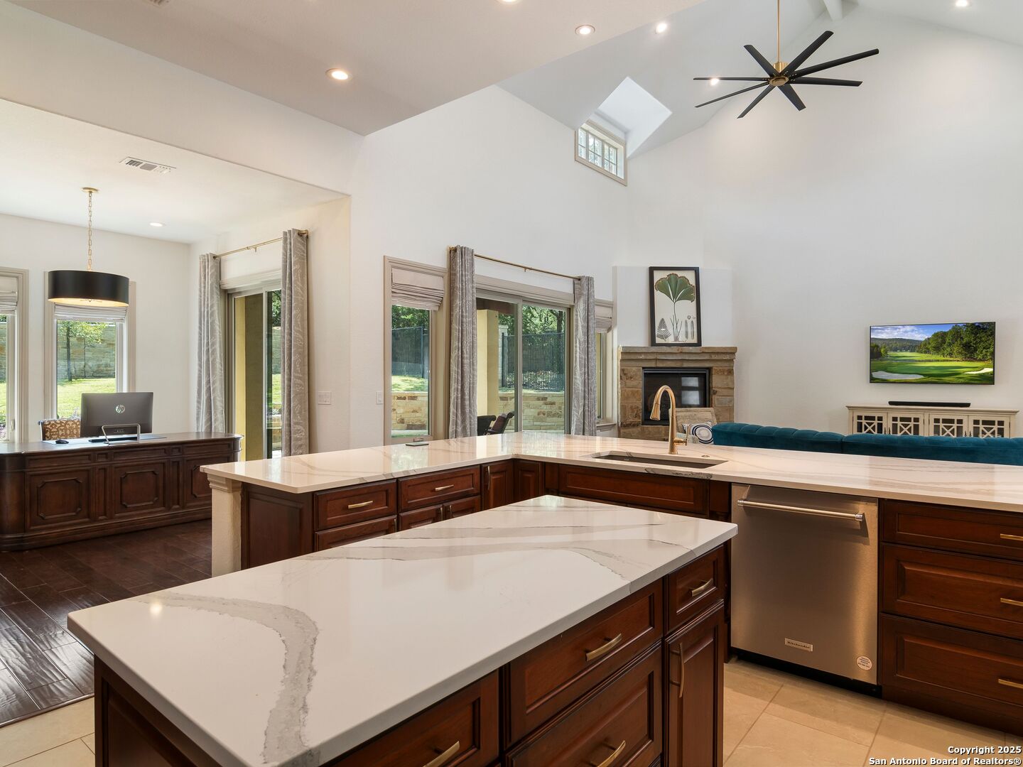 110 Manorbrook San Antonio, TX 78230 - Photo 15 of 40 a kitchen with a stove a sink and a refrigerator
