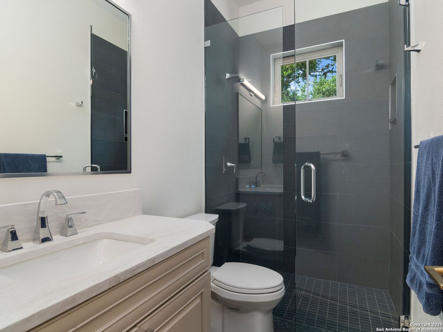110 Manorbrook San Antonio, TX 78230 - Photo 19 of 40 a bathroom with a sink and a toilet