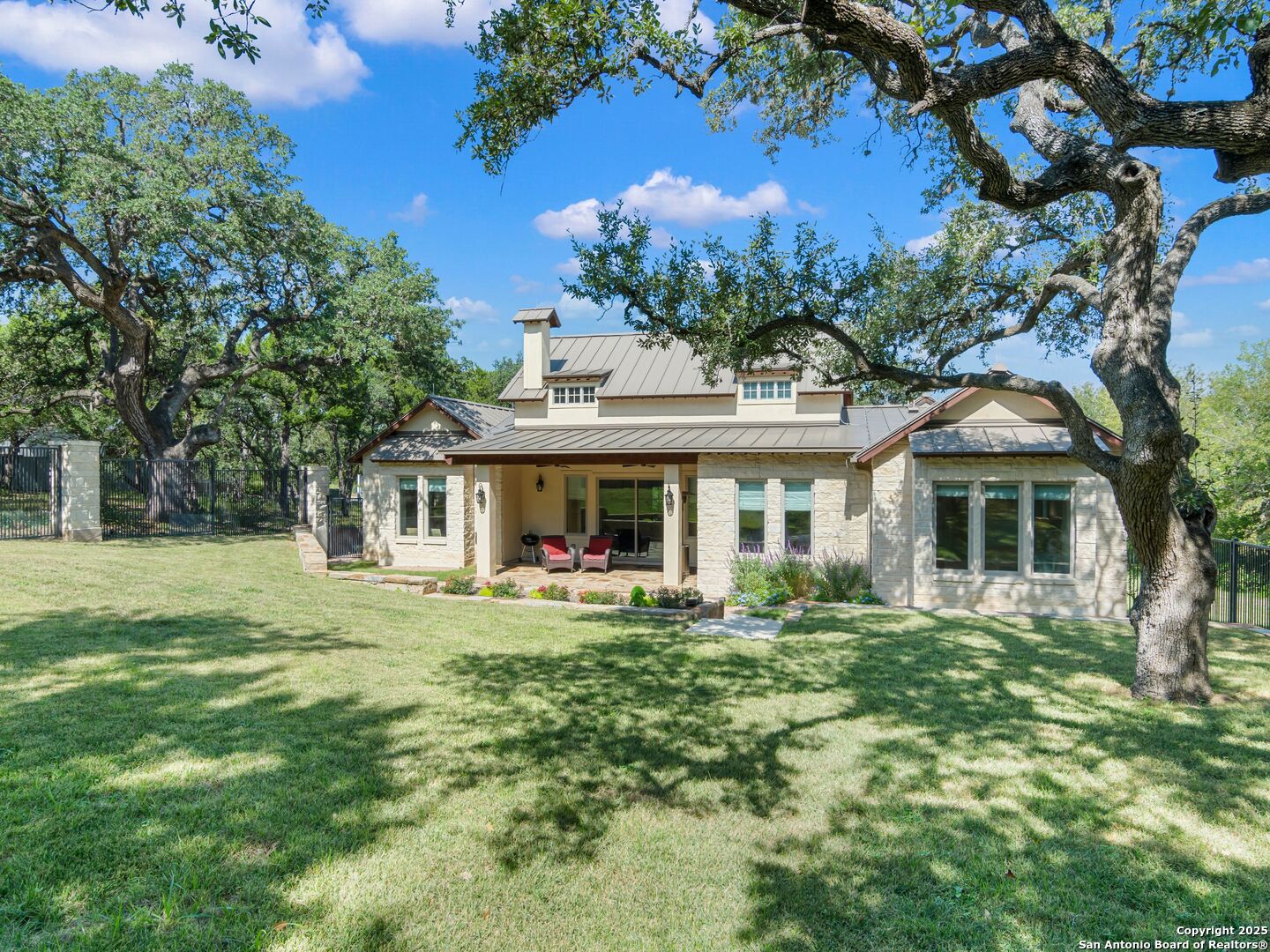 110 Manorbrook San Antonio, TX 78230 - Photo 29 of 40 a front view of house with yard outdoor seating and green space