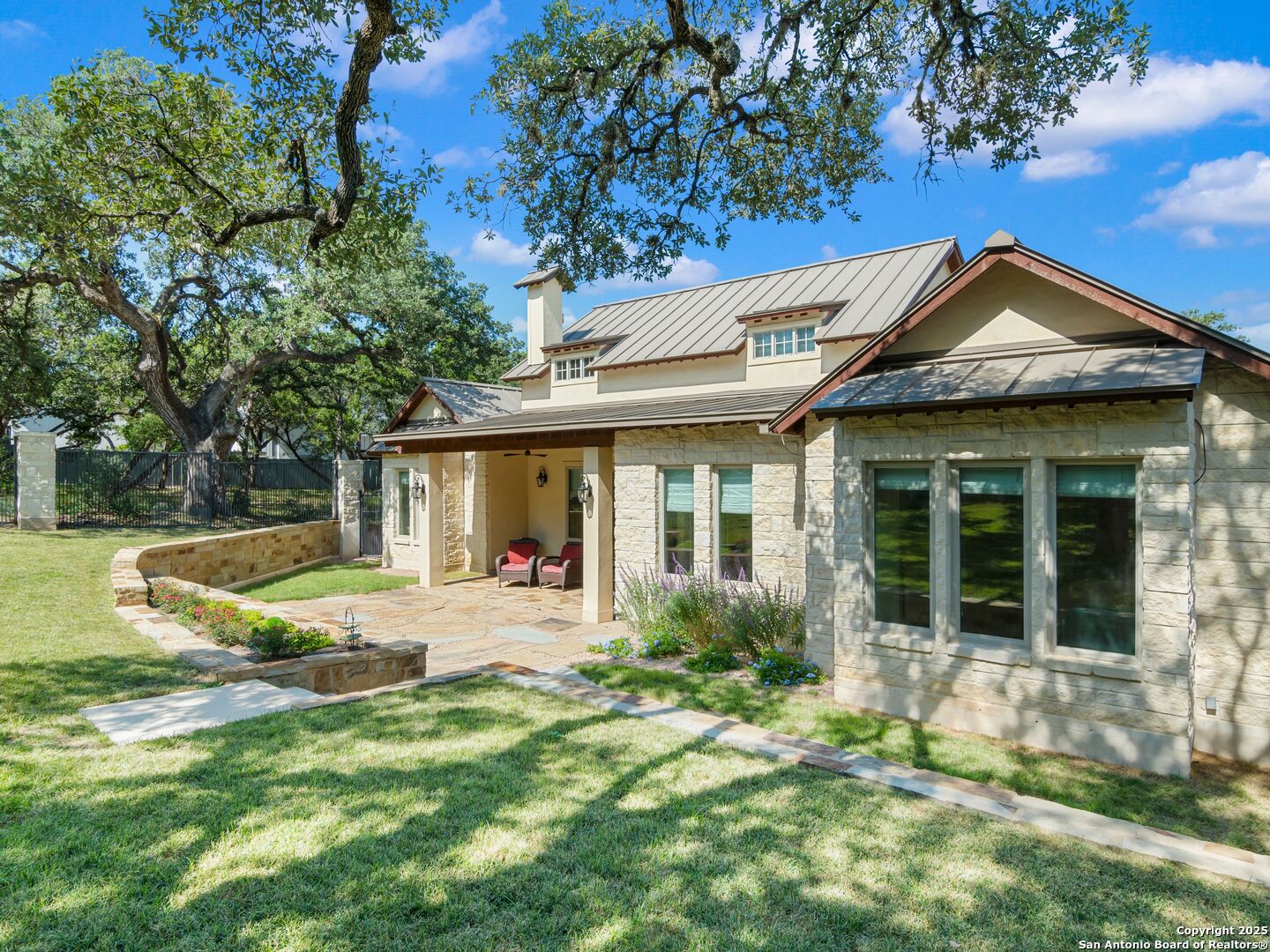 110 Manorbrook San Antonio, TX 78230 - Photo 30 of 40 a view of a house with backyard and sitting area