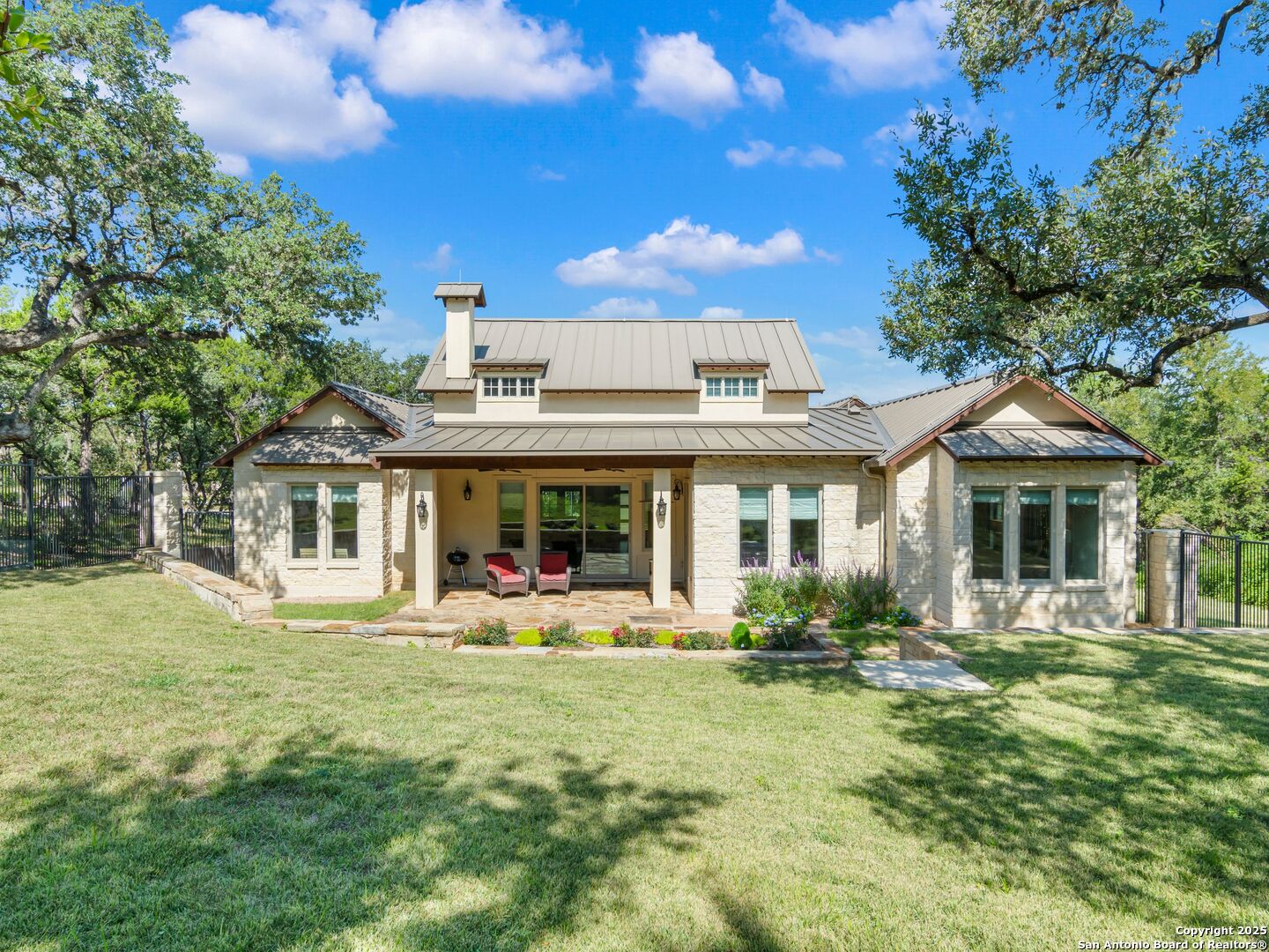 110 Manorbrook San Antonio, TX 78230 - Photo 31 of 40 a front view of a house with garden