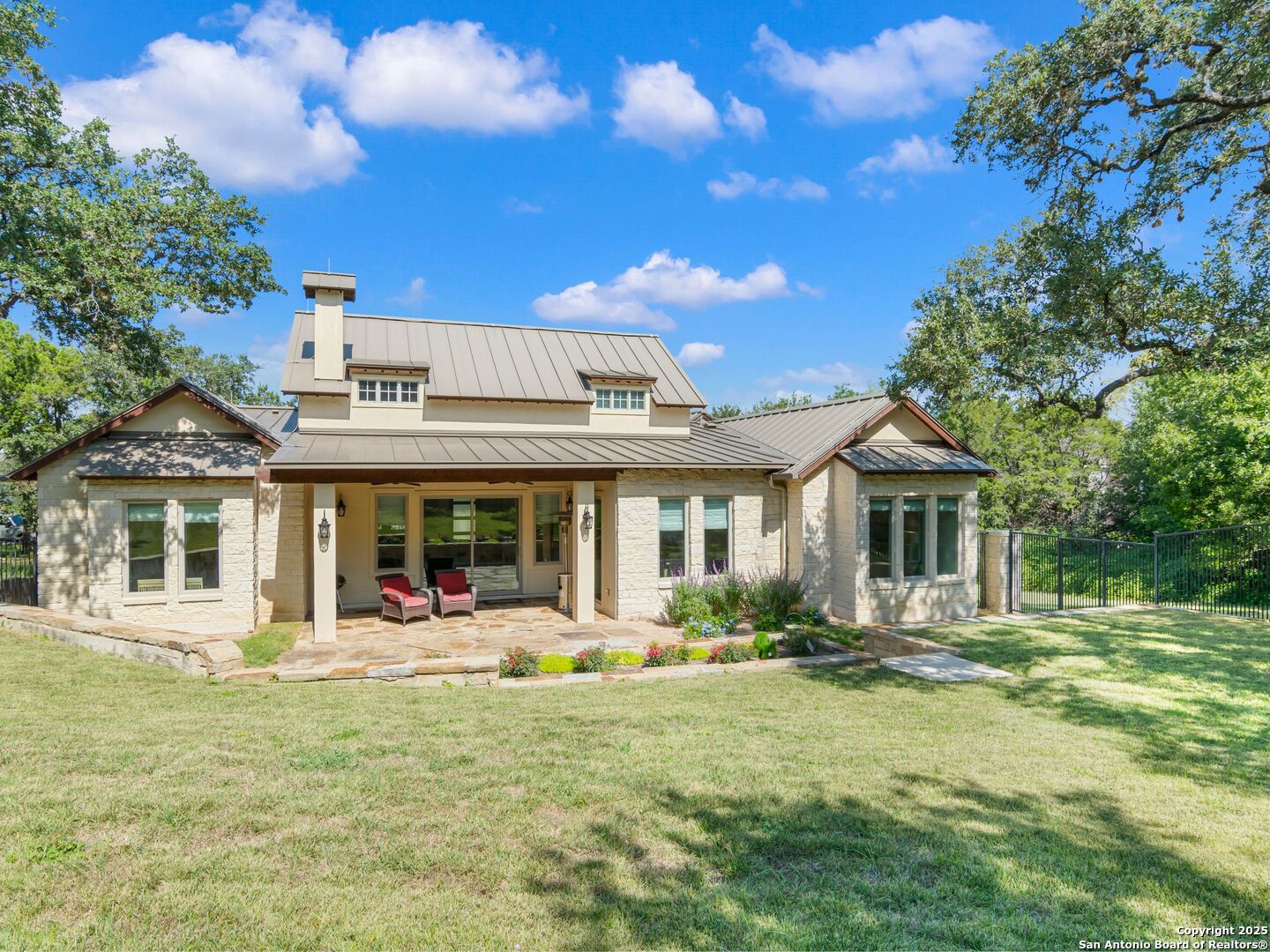 110 Manorbrook San Antonio, TX 78230 - Photo 32 of 40 a front view of a house with garden