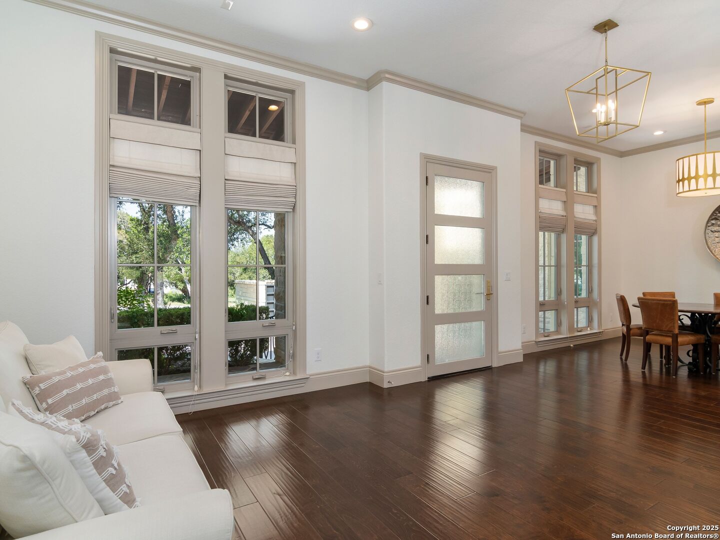110 Manorbrook San Antonio, TX 78230 - Photo 6 of 40 a view of a livingroom with furniture wooden floor and windows