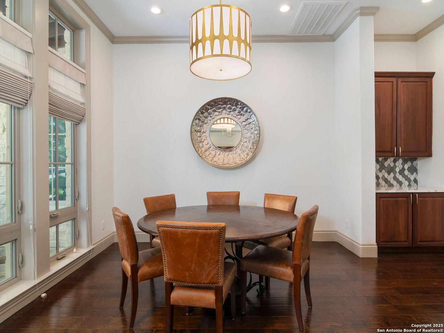 110 Manorbrook San Antonio, TX 78230 - Photo 8 of 40 a view of a dining room with furniture and wooden floor