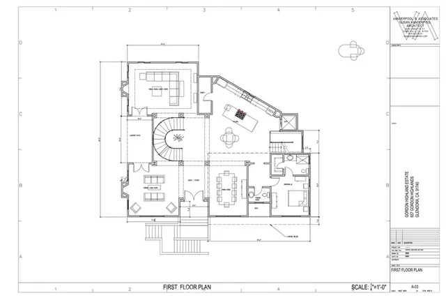 a black and white photo of a living room