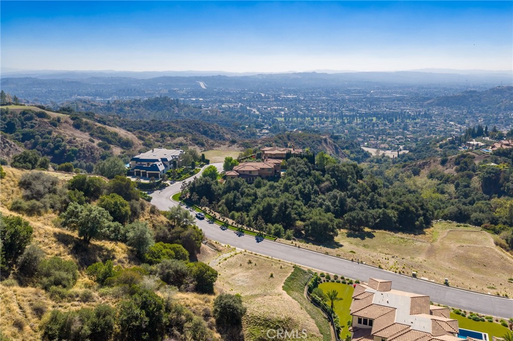 657 Gordon Highlands Road Glendora, CA 91741 - Photo 3 of 31 an aerial view of residential houses with outdoor space
