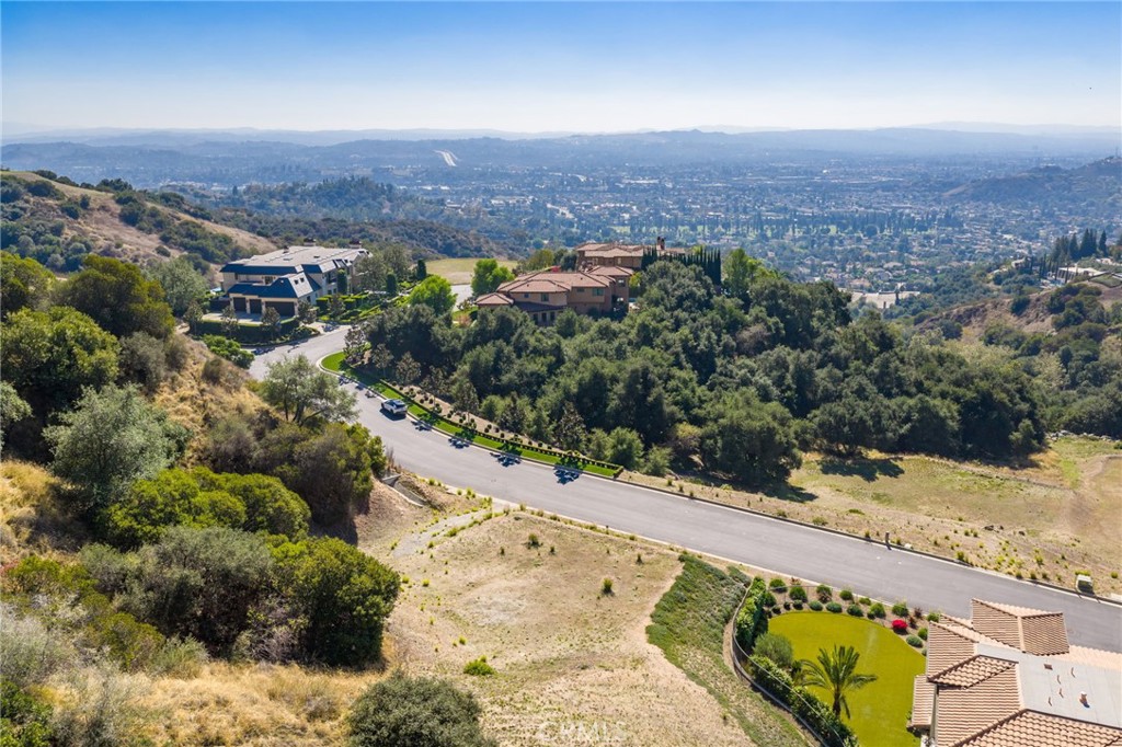 657 Gordon Highlands Road Glendora, CA 91741 - Photo 5 of 31 a view of a lake with a mountain