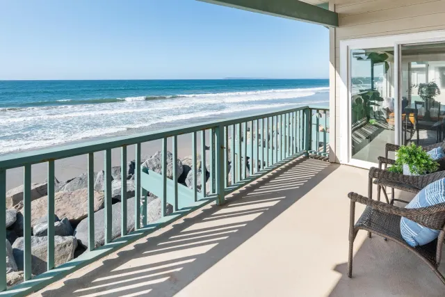 a view of balcony with furniture