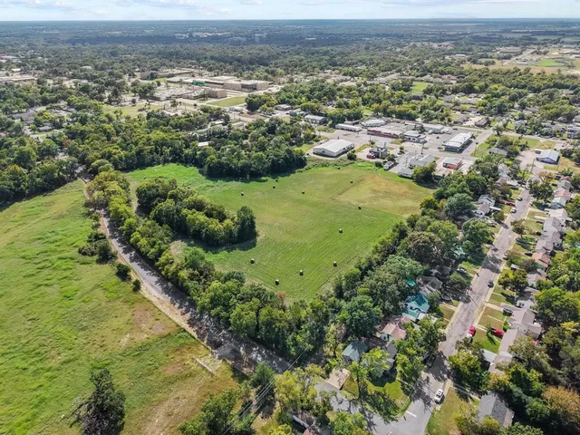 a view of a garden with an buildings