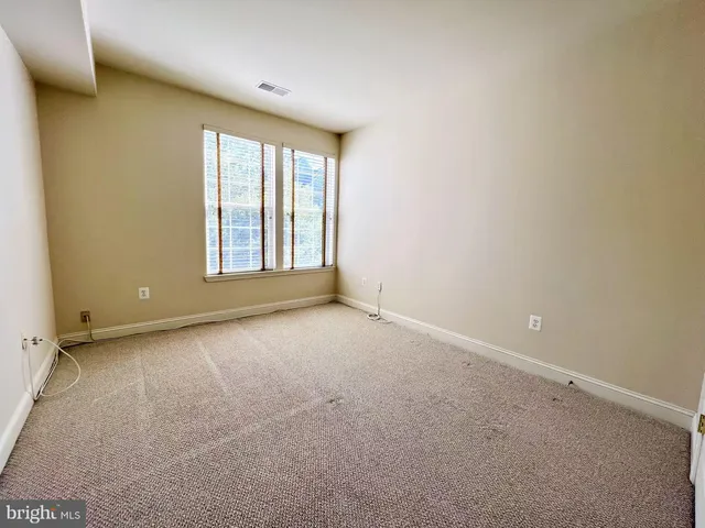 a bathroom with a sink mirror toilet and shower