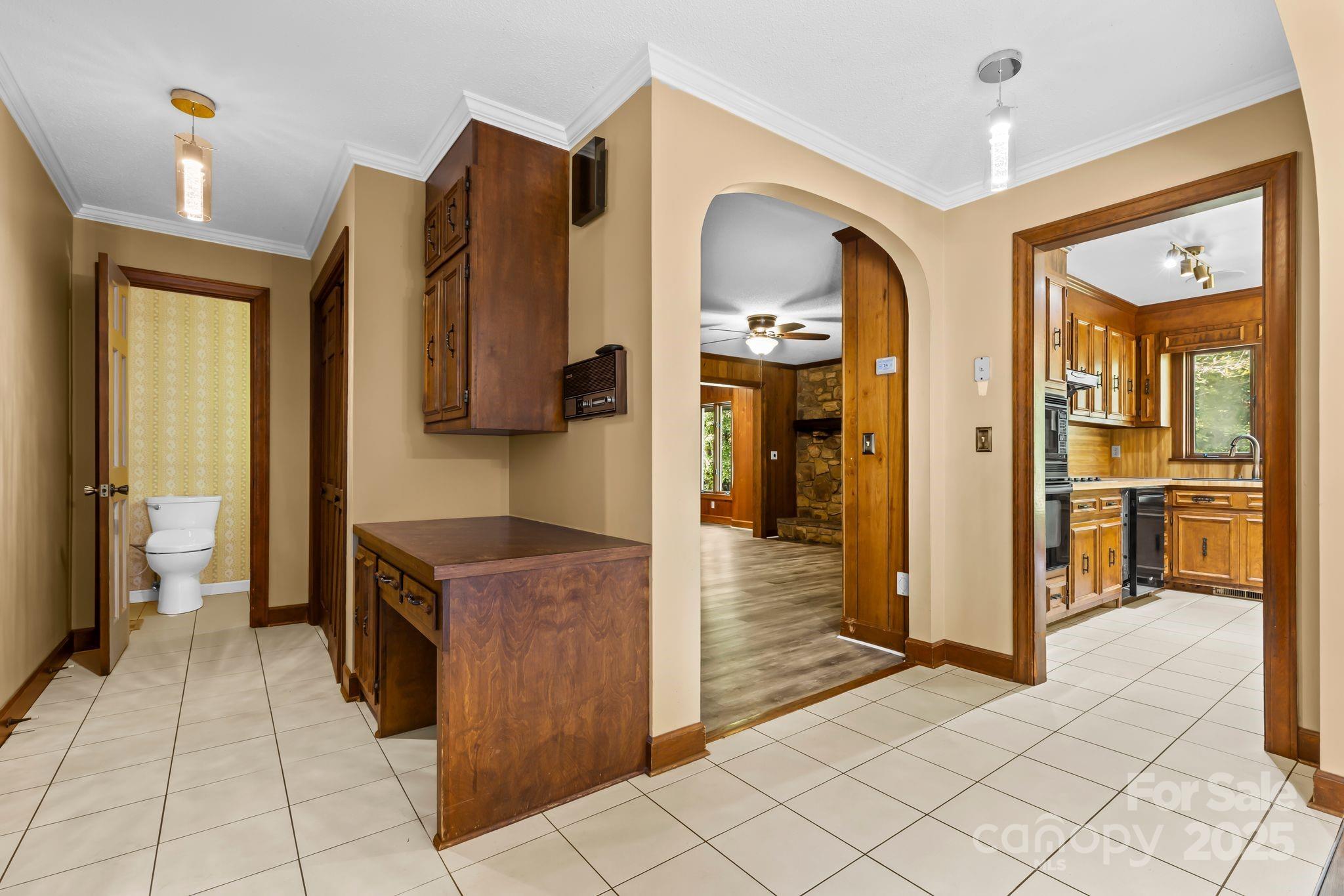 1653 Dudley Shoals Road Granite Falls, NC 28630 - Photo 14 of 48 a view of a kitchen from the dinning room and a window