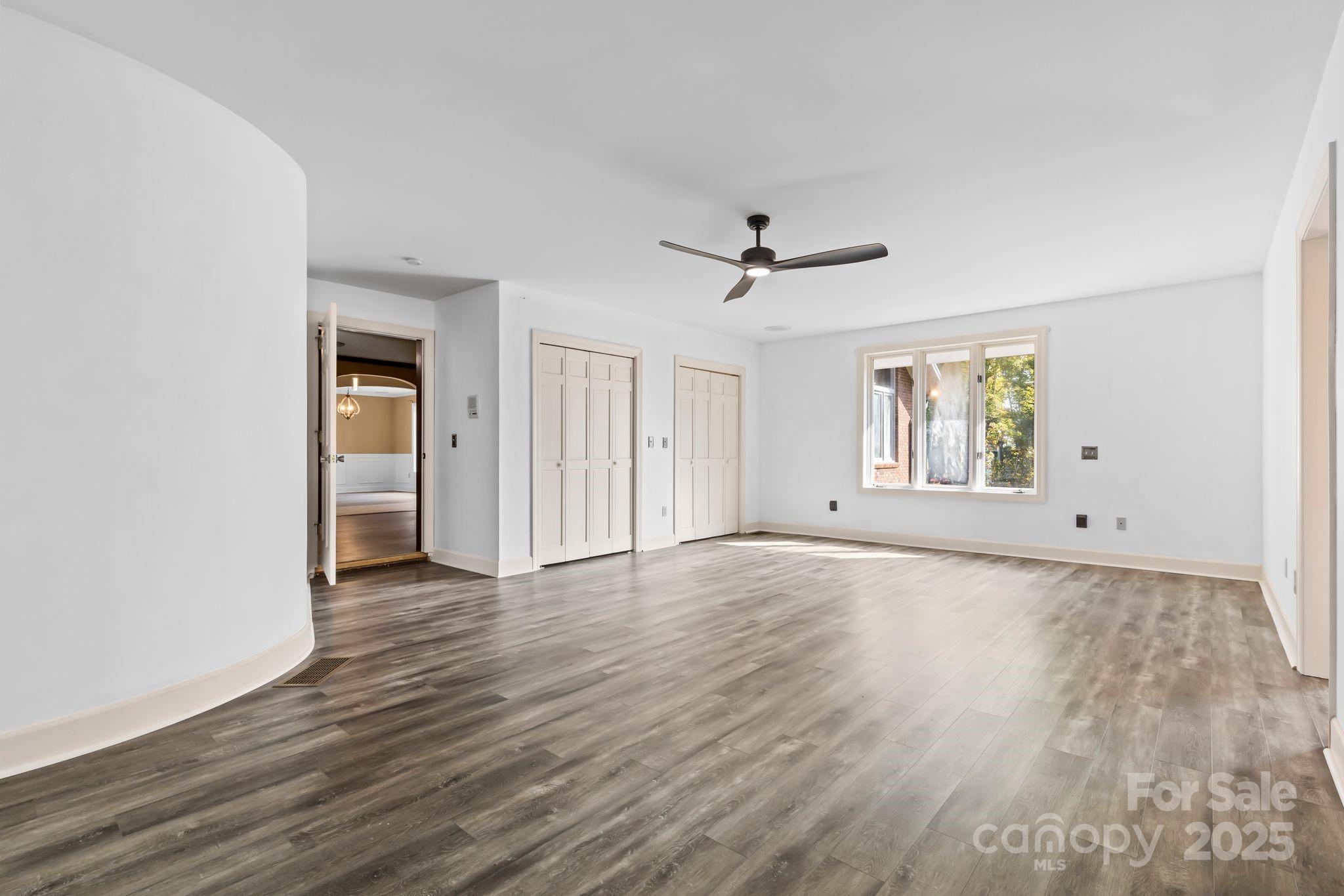 1653 Dudley Shoals Road Granite Falls, NC 28630 - Photo 20 of 48 a view of a livingroom with wooden floor and window