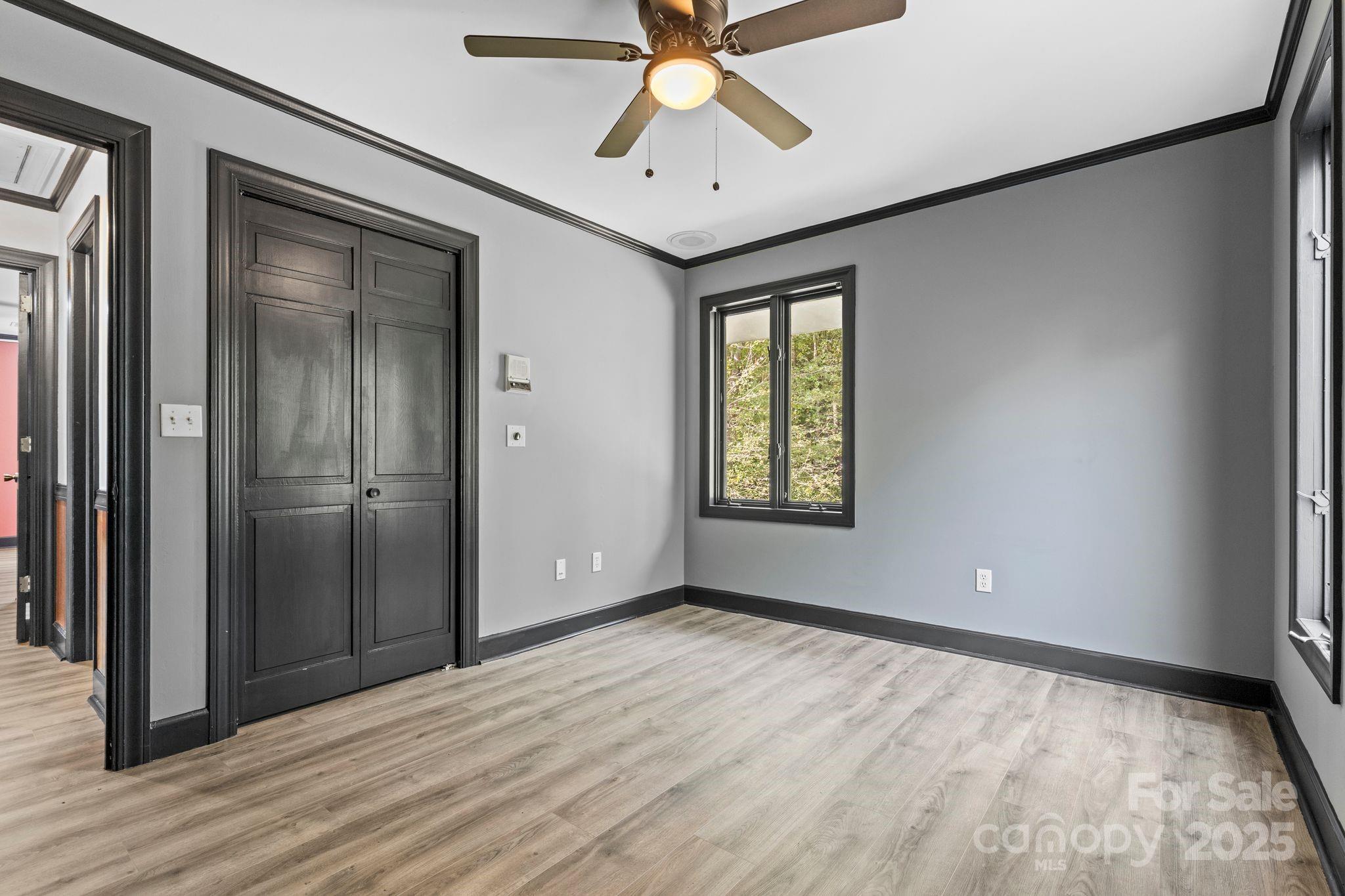 1653 Dudley Shoals Road Granite Falls, NC 28630 - Photo 30 of 48 wooden floor in an empty room with a window